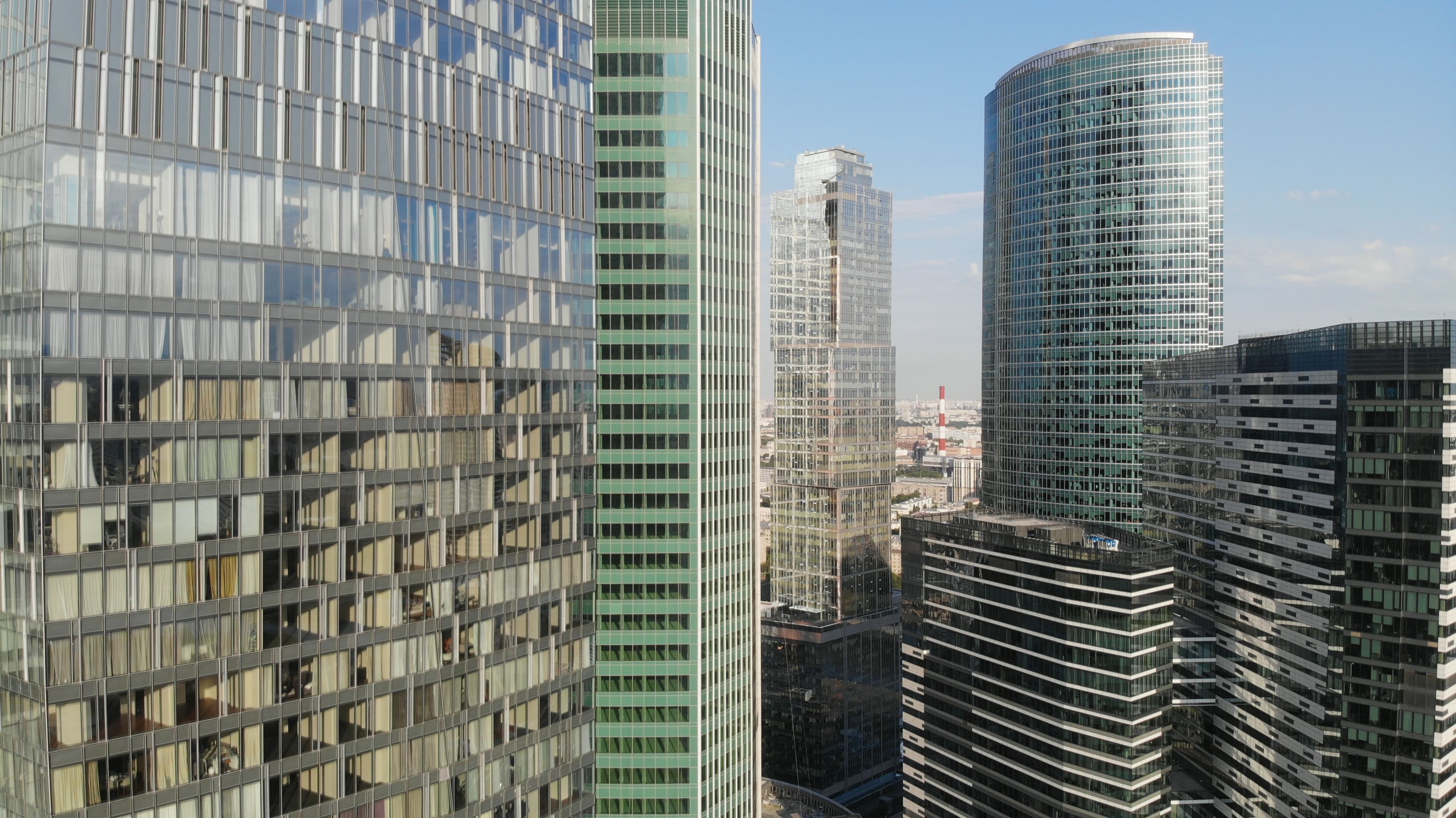 Commercial high-rise district representing multi-location corporate environments